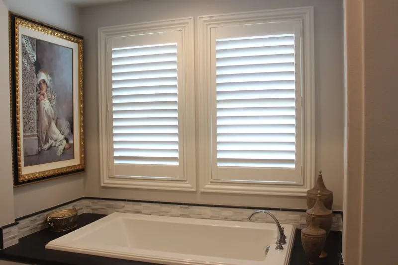 Composite plantation shutters in bathroom